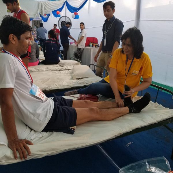 treating patients after Rotary Juhu marathon