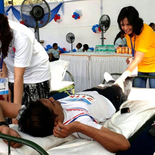 treating patients after Rotary Juhu marathon